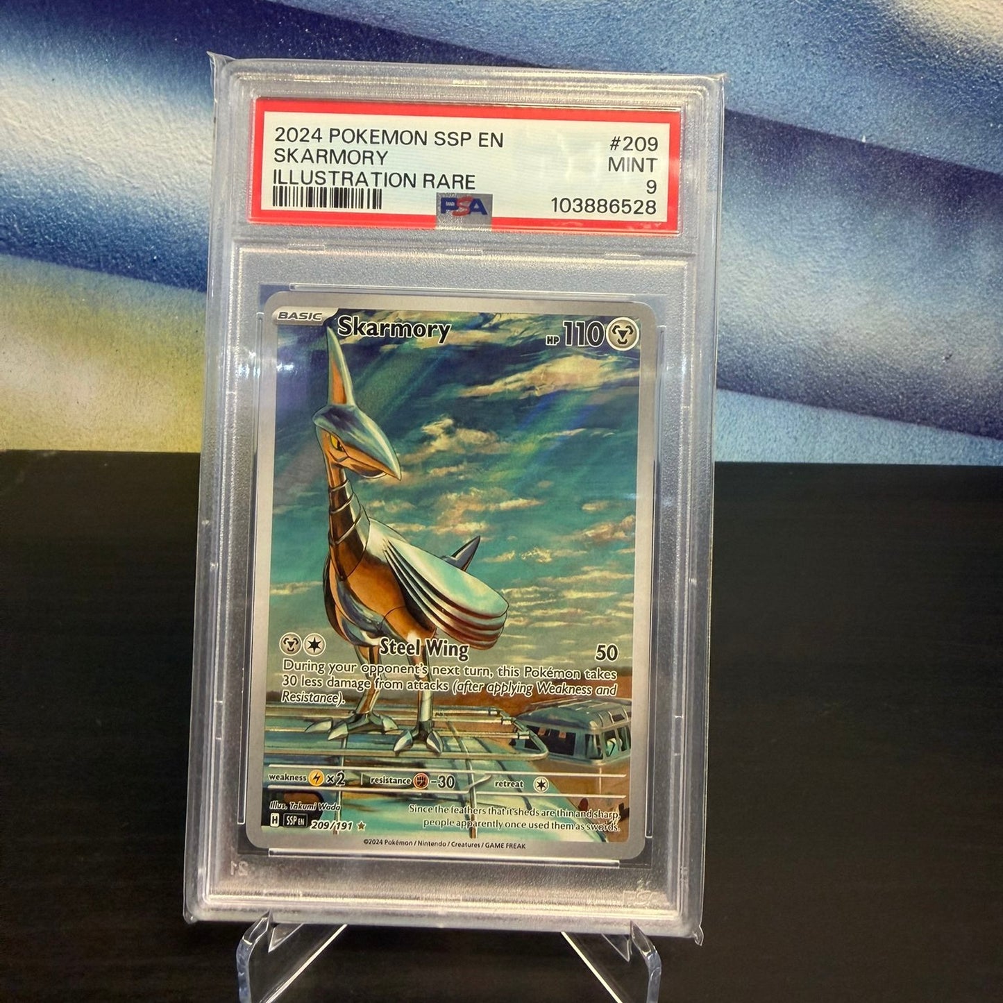Skarmory 209/191 (Surging Sparks) – PSA 9 (English)